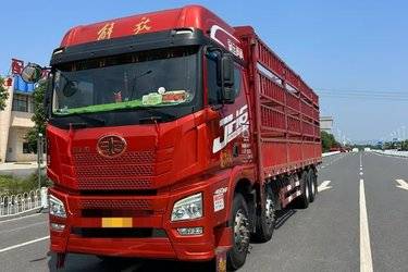 二手青岛解放 JH6重卡 领航版2.0 460马力 8X4 9.4米仓栅式载货车(国五) 前四后八 锡柴二手载货车 黄牌