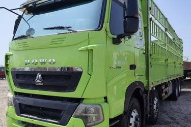 二手中国重汽 HOWO T7H重卡 460马力 8X4 9.5米仓栅式载货车(国五) 前四后八 曼二手载货车 黄牌