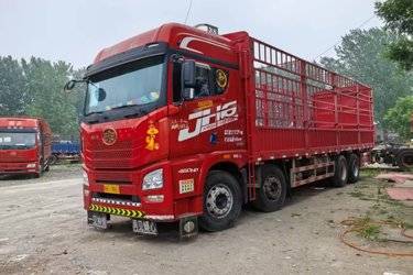 二手青岛解放 JH6重卡 460马力 8X4 9.5米仓栅式载货车(潍柴发动机)(国五) 前四后八 潍柴二手载货车 黄牌
