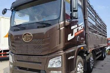 二手青岛解放 JH6重卡 420马力 8X4 9.5米仓栅式载货车(3.727速比)(国五) 前四后八 锡柴二手载货车 黄牌