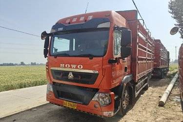 二手中国重汽 HOWO TX重卡 240马力 4X2 6.8米仓栅式载货车(国五) 单桥 曼二手载货车 黄牌