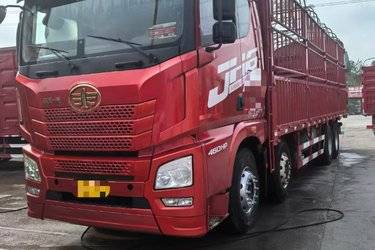二手青岛解放 JH6重卡 领航版2.0 460马力 8X4 9.4米仓栅式载货车(国五) 前四后八 一汽二手载货车 黄牌