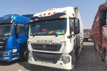 二手中国重汽 HOWO TX7 270马力 4X2 9.6米厢式载货车(国六) 单桥 曼二手载货车 黄牌图片