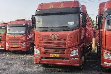 二手青岛解放 JH6重卡 智尊版 460马力 8X4 9.5米仓栅式载货车(国五) 前四后八 锡柴二手载货车 黄牌