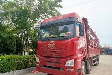 二手青岛解放 JH6重卡 领航版2.0 420马力 8X4 9.4米仓栅式载货车(后桥435升级)(国五) 前四后八 锡柴二手载货车 黄牌