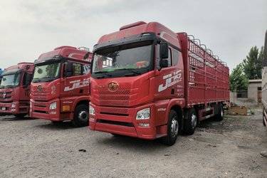 二手青岛解放 JH6重卡 领航版2.0 320马力 6X2 9.4米仓栅式载货车(速比4.111)(国五) 前四后四 锡柴二手载货车 黄牌
