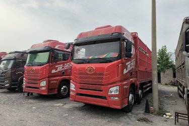 二手青岛解放 JH6重卡 领航版 290马力 6X2 9.5米仓栅式载货车(国五) 前四后四 锡柴二手载货车 黄牌