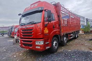 二手青岛解放 途V重卡 350马力 8X4 9.5米仓栅式载货车(国五) 前四后八 锡柴二手载货车 黄牌