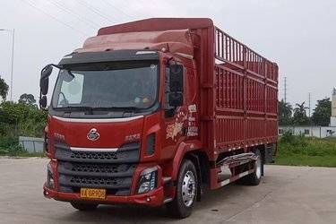 二手东风柳汽 新乘龙M3中卡 200马力 4X2 6.75米仓栅式载货车(国五) 单桥 康明斯二手载货车 黄牌图片