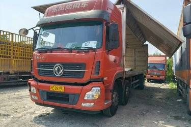 二手东风商用车 天龙重卡 245马力 6X2 9.6米翼开启厢式载货车(国五) 前四后四 东风康明斯二手载货车 黄牌图片