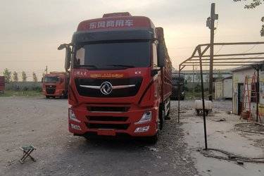 二手东风商用车 天龙旗舰KX 560马力 8X4 9.4米AMT自动档仓栅式载货车(国六) 前四后八 东风康明斯二手载货车 黄牌图片