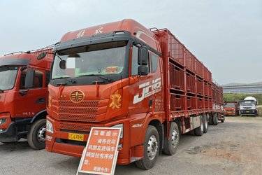 二手青岛解放 JH6重卡 智享版 460马力 8X4 9.5米仓栅式载货车(国六) 前四后八 潍柴二手载货车 黄牌