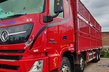 二手东风商用车 天龙旗舰KX 465马力 8X4 9.4米AMT自动档仓栅式载货车(国六) 前四后八 东风康明斯二手载货车 黄牌图片