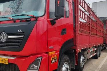 二手东风商用车 天龙KL重卡 465马力 8X4 9.4米仓栅式载货车(国五) 前四后八 雷诺二手载货车 黄牌图片