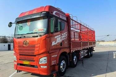 二手青岛解放 JH6重卡 领航版2.0 460马力 8X4 9.4米仓栅式载货车(国六) 前四后八 锡柴二手载货车 黄牌图片