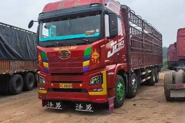 二手青岛解放 JH6重卡 领航版2.0 460马力 8X4 9.5米仓栅式载货车(国五) 前四后八 锡柴二手载货车 黄牌