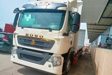 二手中国重汽 HOWO TX7 270马力 4X2 9.52米翼开启厢式载货车(国六) 单桥 曼二手载货车 黄牌
