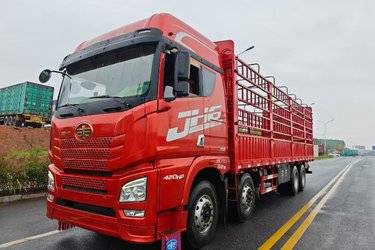 二手青岛解放 JH6重卡 领航版2.0 420马力 8X4 9.4米仓栅式载货车(后桥435升级)(国五) 前四后八 锡柴二手载货车 黄牌