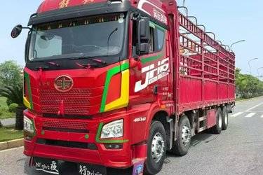 二手青岛解放 JH6重卡 领航版2.0 460马力 8X4 9.5米仓栅式载货车(国五) 前四后八 潍柴二手载货车 黄牌