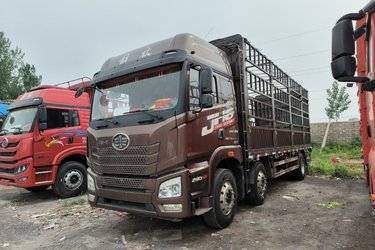 二手青岛解放 JH6重卡 290马力 6X2 7.6米仓栅式载货车(国五) 前四后四 锡柴二手载货车 黄牌
