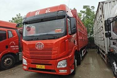 二手青岛解放 JH6 智享版 350马力 6X2 9.5米仓栅式载货车(国六) 前四后四 锡柴二手载货车 黄牌
