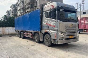 二手青岛解放 JH6重卡 领航版2.0 520马力 8X4 9.4米仓栅式载货车(国六) 前四后八 锡柴二手载货车 黄牌