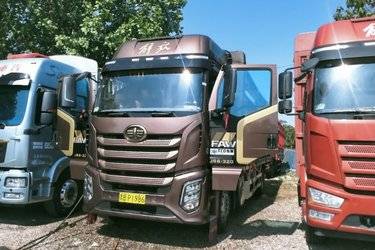 二手一汽解放 J6G 领航版 320马力 4X2 6.75米仓栅式载货车(国六) 单桥 锡柴二手载货车 黄牌图片