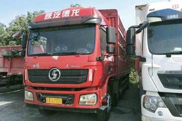 二手陕汽重卡 德龙L3000 300马力 6X2 9.7米仓栅式载货车(国五) 前四后四 玉柴二手载货车 黄牌图片