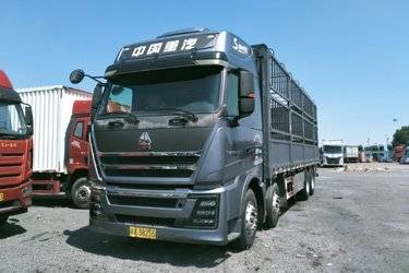 二手中国重汽 HOWO TH7重卡 500马力 8X4 9.5米仓栅式载货车(国六) 前四后八 曼二手载货车 黄牌图片