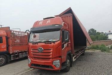二手青岛解放 JK6中卡 260马力 4X2 9.75米翼开启厢式载货车(国六) 单桥 锡柴二手载货车 黄牌图片