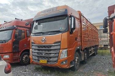 二手东风柳汽 乘龙H7重卡 385马力 8X4 9.6米仓栅式载货车(国五) 前四后八 玉柴二手载货车 黄牌图片