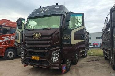 二手一汽解放 J6V 领航版 580马力 8X4 9.5米仓栅式载货车(国六) 前四后八 锡柴二手载货车 黄牌图片
