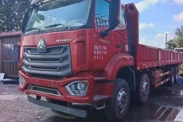 二手中国重汽 HOWO TH7重卡 460马力 8X4 8.6米栏板载货车(国六) 前四后八 曼二手载货车 黄牌图片