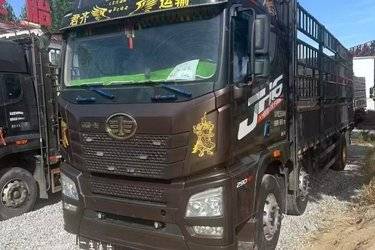 二手青岛解放 JH6重卡 290马力 6X2 7.7米仓栅式载货车(国五) 前四后四 锡柴二手载货车 黄牌