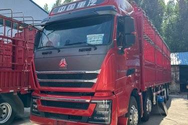 二手中国重汽 HOWO TH7重卡 480马力 8X4 9.3米仓栅式载货车(国六) 前四后八 曼二手载货车 黄牌图片