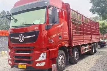 二手东风商用车 天龙旗舰KX 465马力 8X4 9.4米仓栅式载货车(国六) 前四后八 东风康明斯二手载货车 黄牌图片