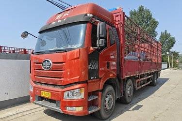 二手一汽解放 新J6P重卡 320马力 6X2 9.65米仓栅式载货车(国六) 前四后四 锡柴二手载货车 黄牌图片