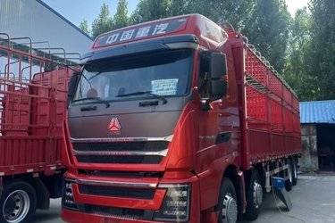 二手中国重汽 HOWO TH7重卡 480马力 8X4 9.5米仓栅式载货车(国六) 前四后八 曼二手载货车 黄牌图片