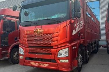 二手青岛解放 JH6重卡 领航版2.0 460马力 8X4 8.2米仓栅式载货车(国五) 前四后八 锡柴二手载货车 黄牌图片