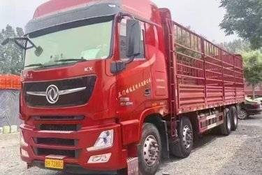 二手东风商用车 天龙旗舰KX 465马力 8X4 9.4米仓栅式载货车(国六) 前四后八 东风康明斯二手载货车 黄牌图片