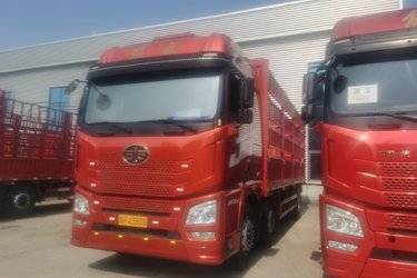 二手青岛解放 JH6 智享版 320马力 6X2 7.7米仓栅式载货车(国六) 前四后四 锡柴二手载货车 黄牌