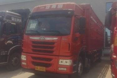 二手青岛解放 悍V重卡 260马力 6X2 7.7米仓栅式载货车(国五) 前四后四 锡柴二手载货车 黄牌图片