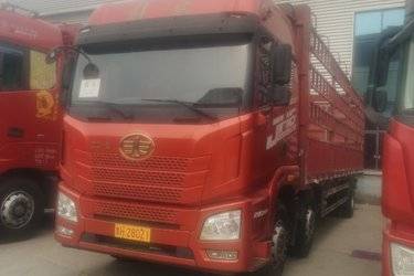二手青岛解放 JH6重卡 290马力 6X2 9.5米仓栅式载货车(国五) 前四后四 锡柴二手载货车 黄牌图片