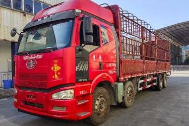 二手一汽解放 J6P重卡 350马力 8X4 9.5米仓栅式载货车(国四) 前四后八 一汽二手载货车 黄牌图片