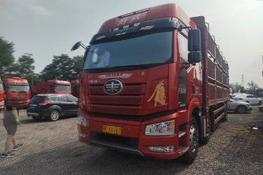 二手一汽解放 新J6P重卡 320马力 8X4 9.65米仓栅式载货车(国五) 前四后八 新晨动力二手载货车 黄牌图片