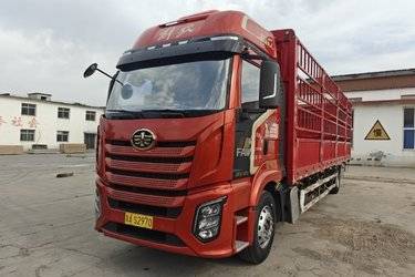 二手一汽解放 J6G 领航版 320马力 6X2 9.7米仓栅式载货车(平顶)(国六) 单桥 锡柴二手载货车 黄牌图片