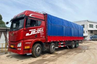 二手青岛解放 JH6重卡 460马力 8X4 9.4米载货车底盘(国五) 前四后八 锡柴二手载货车 黄牌图片