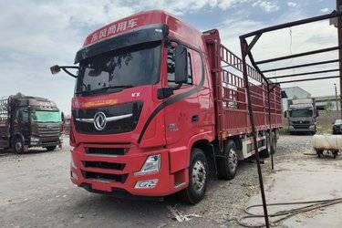 二手东风商用车 天龙旗舰KX 560马力 8X4 9.4米AMT自动档仓栅式载货车(国六) 前四后八 康明斯二手载货车 黄牌图片