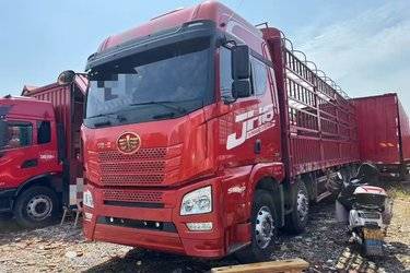 二手青岛解放 JH6 智享版 510马力 8X4 9.5米仓栅式载货车(国六) 前四后八 潍柴二手载货车 黄牌图片
