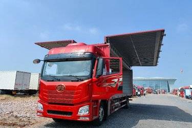 二手青岛解放 JH6 智尊版 320马力 9.7米翼开启厢式载货车(国六) 单桥 锡柴二手载货车 黄牌